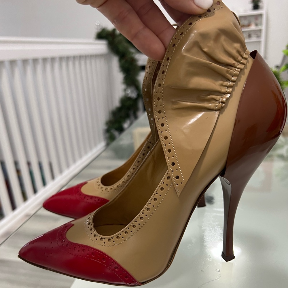 Rare Runway stilettos. Really beautiful boy unfortunately fit small for me.